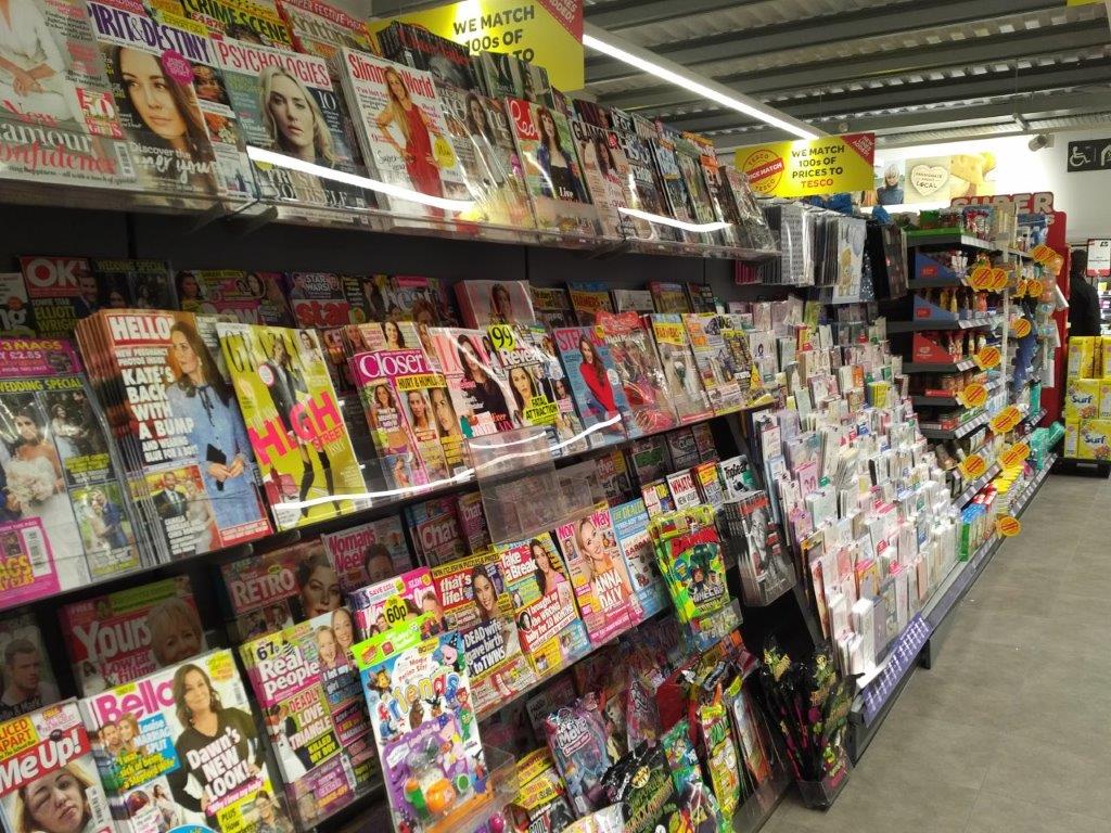 Convenience store magazine rack