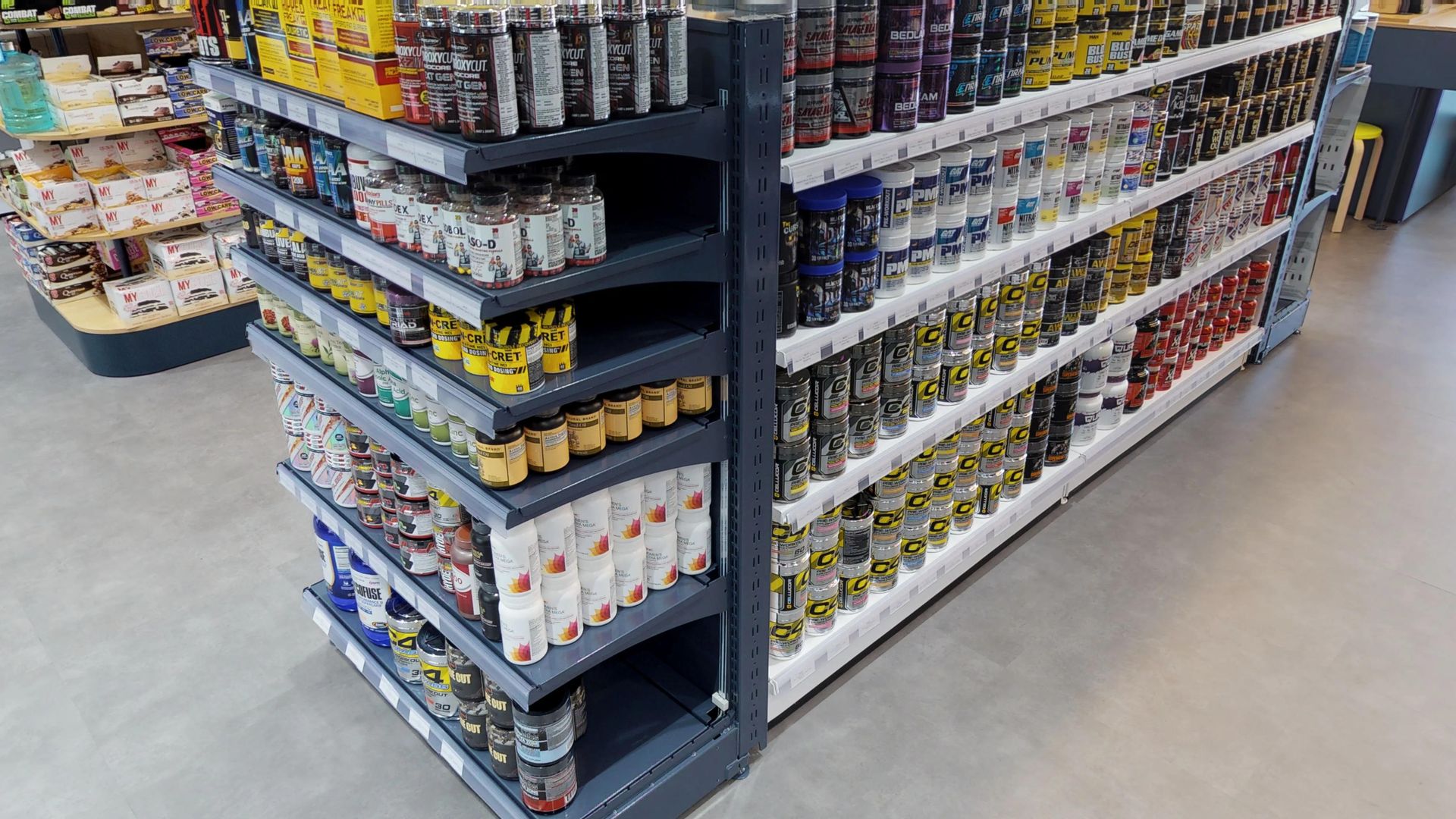Nutrition Shops Shelves Illuminated with Ardente
